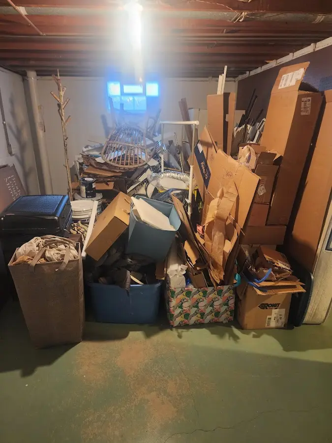 Roll-off dumpster container at job site for Cleanout Dumpster Rental in Orange Cove